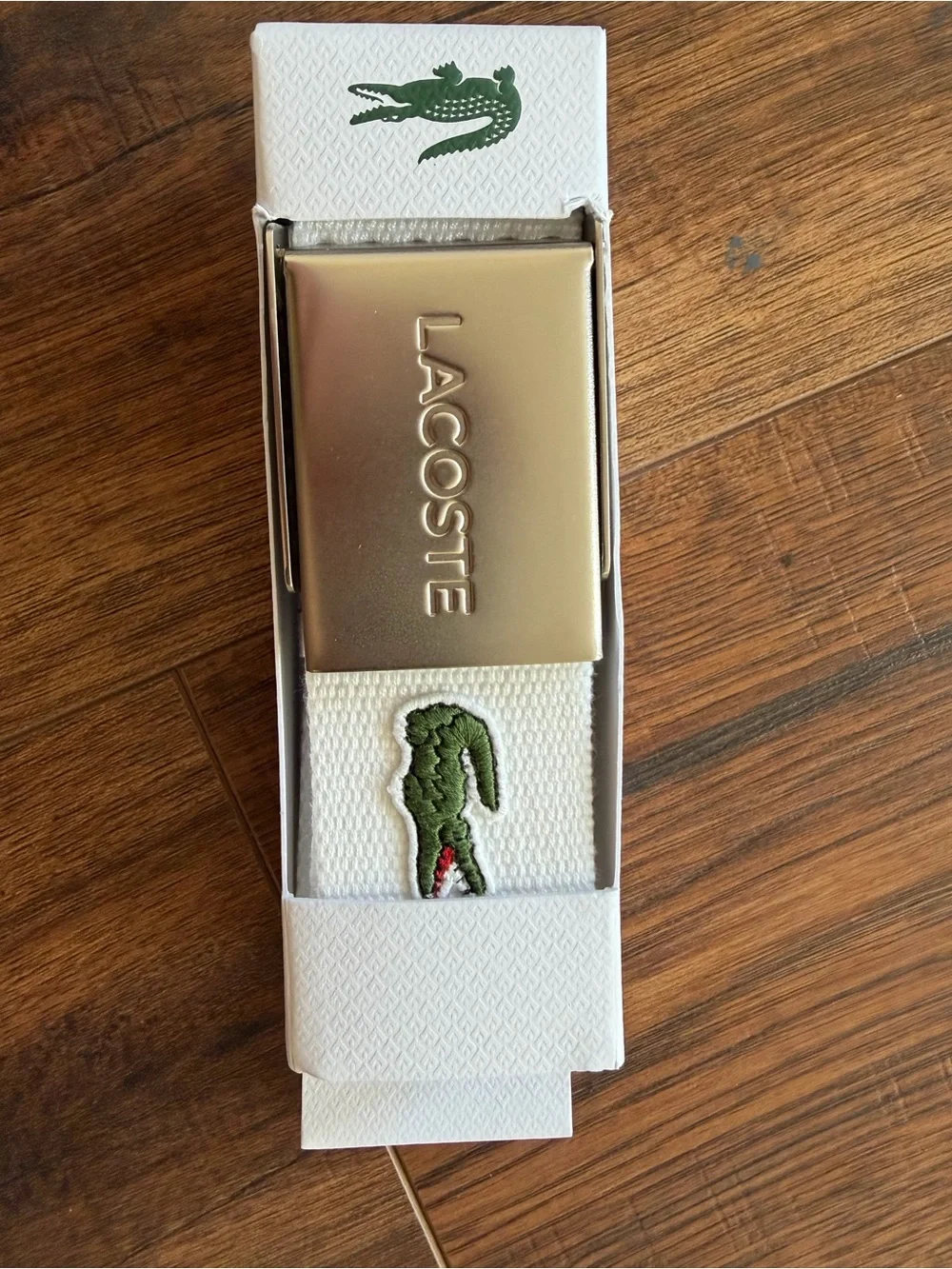 Lacoste white belt with green crocodile logo